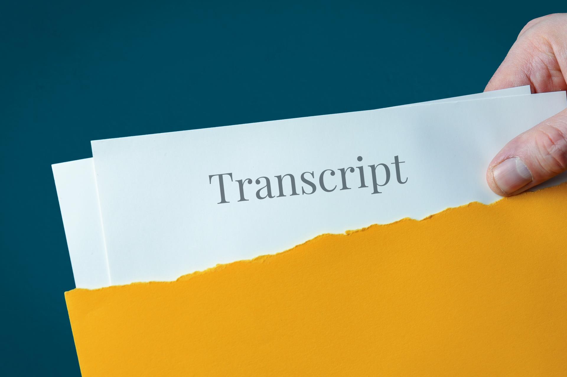 Transcript Being Pulled from an Envelope