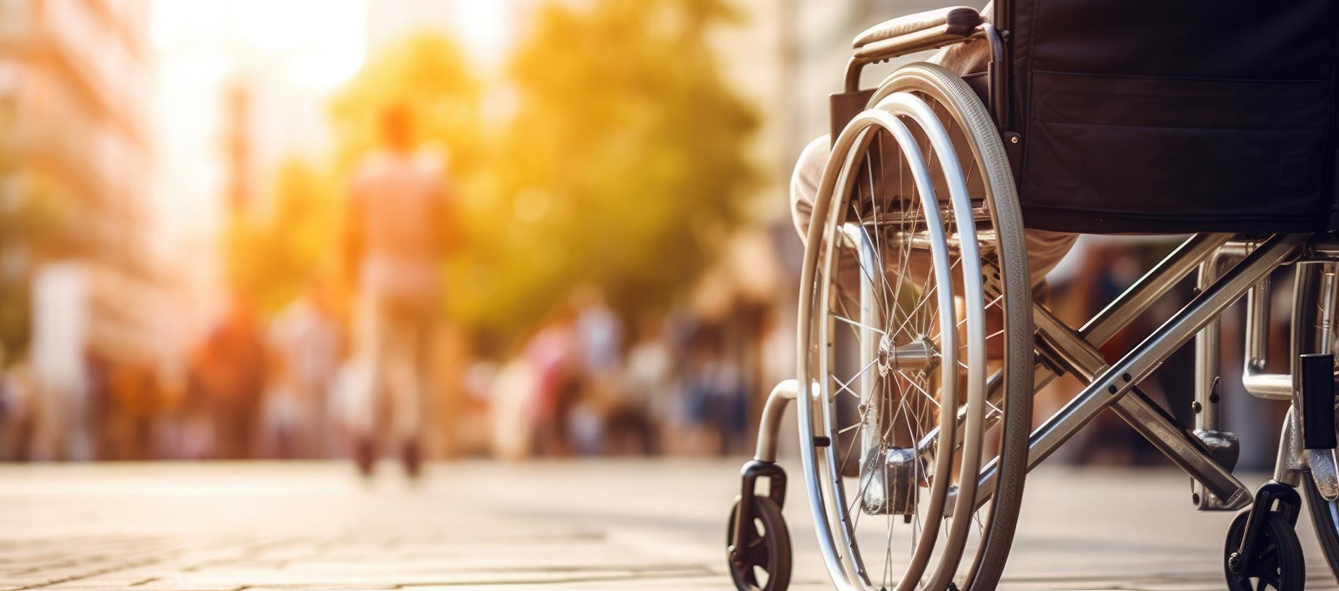 Banner of a person in a wheelchair without face. Close up of wheelchair. Dramatic style. Patient with disability.