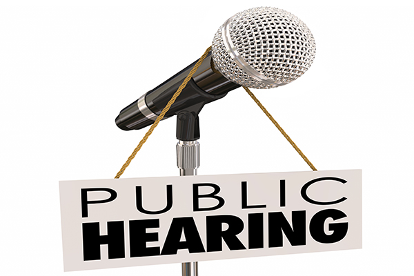 microphone saying public hearing