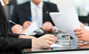 People Meeting around Table